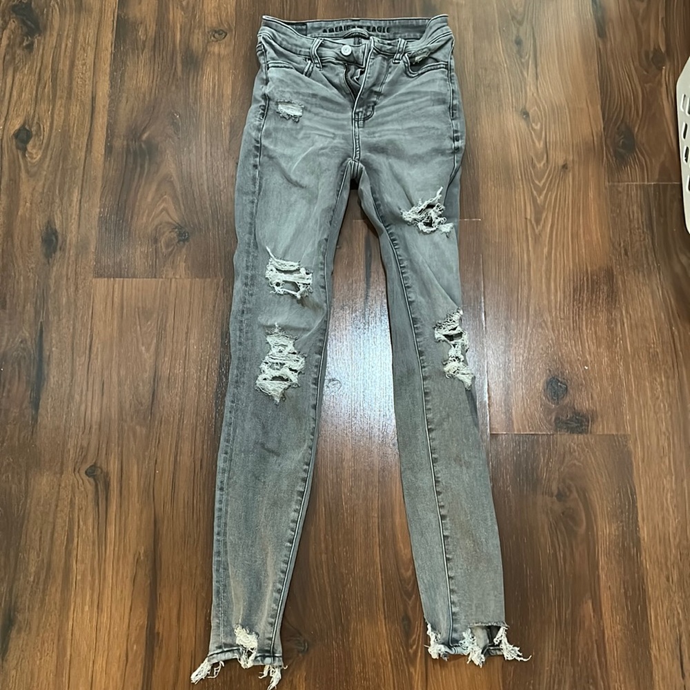 Grey distressed American Eagle skinny jeans